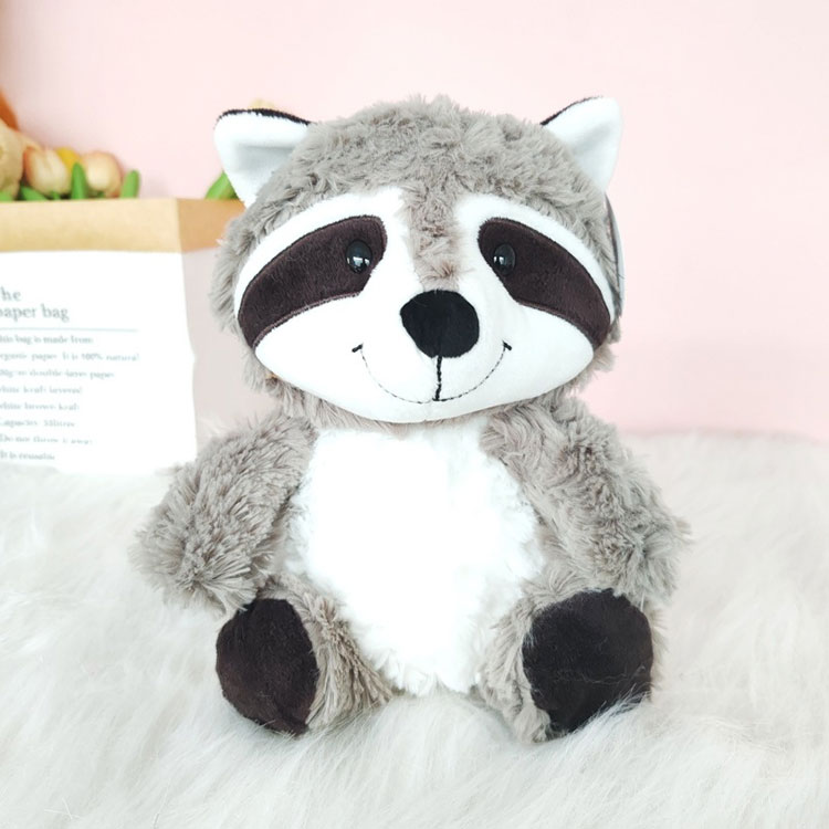 Ρακούν βελούδινο παιχνίδι με μεγάλη αφράτη ουρά